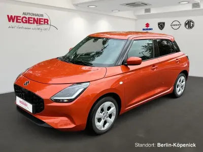 Gebraucht Suzuki Swift Comfort 83 PS (61 kW) 2025 Flame orange pearl metallic Kleinwagen
