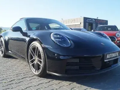 Gebraucht Porsche 992 394 PS (289 kW) 2025 Schwarz Coupé