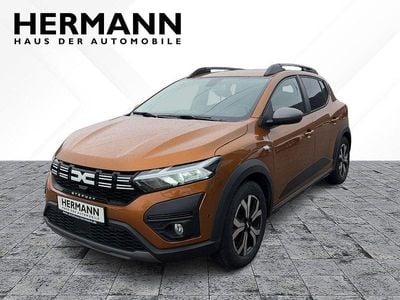 Gebraucht Dacia Sandero Expression 101 PS (74 kW) 2023 Taklamakanorange (orange) Kleinwagen