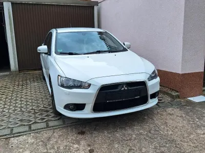Gebraucht Mitsubishi Lancer 150 PS (110 kW) 2014 Weiß Limousine