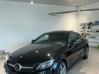 Używany Mercedes C400 333 KM (244 kW) 2016 Czarny Coupe