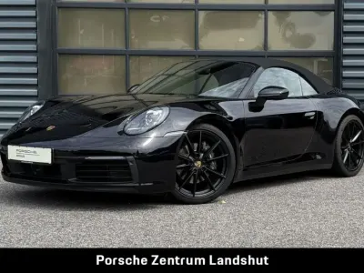 Gebraucht Porsche 911 Carrera 4 Cabriolet 385 PS (283 kW) 2023 Tiefschwarzmetallic Cabrio