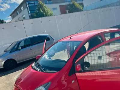 Gebraucht Toyota Aygo 68 PS (50 kW) 2007 Rot Kleinwagen