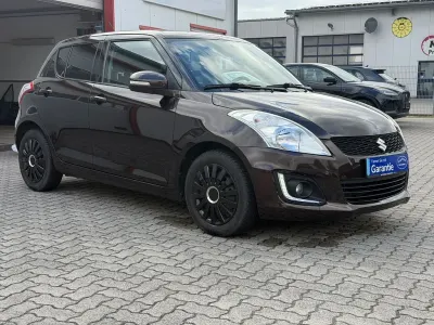 Gebraucht Suzuki Swift Comfort 94 PS (69 kW) 2015 Braun Kleinwagen