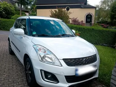 Gebraucht Suzuki Swift Club 94 PS (69 kW) 2015 Weiß Kleinwagen