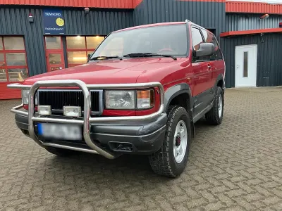Używany Opel Monterey 176 KM (129 kW) 1992 Czerwony SUV