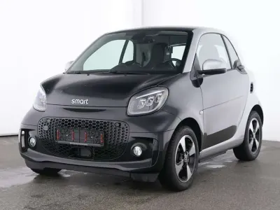 Gebraucht Smart ForTwo Coupé Passion Exclusive 60 kW (82 PS) 2024 Bodypanels in black Coupé
