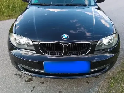 Gebraucht BMW 116 116 PS (85 kW) 2009 Schwarz Kleinwagen