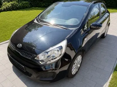 Gebraucht Kia Rio 109 PS (80 kW) 2011 Schwarz Limousine