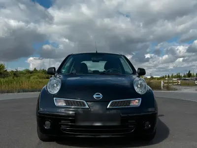Gebraucht Nissan Micra 65 PS (47 kW) 2010 Schwarz Kleinwagen