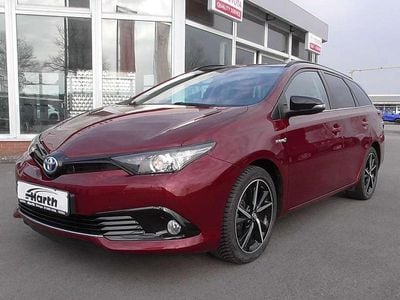 Gebraucht Toyota Auris Hybrid 99 PS (72 kW) 2018 Red/ black mica Kombi