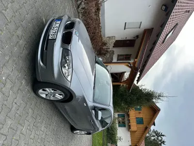 Gebraucht BMW 116 122 PS (89 kW) 2010 Grau Kleinwagen