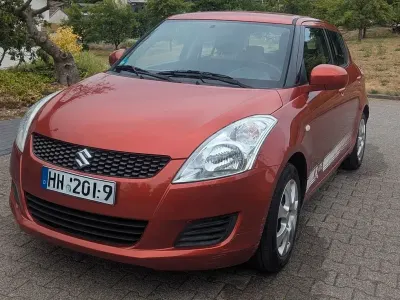 Gebraucht Suzuki Swift Club 94 PS (69 kW) 2011 Orange Kleinwagen