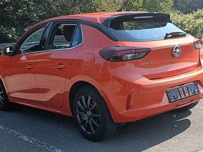 Second-hand Opel Corsa-e Elegance 100 kW (136 CP) 2023 Portocaliu Hatchback