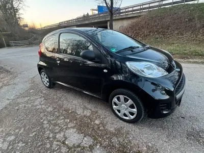 Gebraucht Peugeot 107 68 PS (50 kW) 2009 Schwarz Kleinwagen