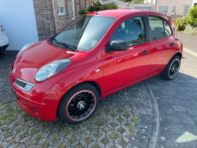 Gebraucht Nissan Micra Comfort 65 PS (47 kW) 2010 Rot Kleinwagen