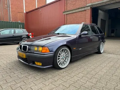Gebraucht BMW 323 M Sport 189 PS (139 kW) 1996 Violet Kombi