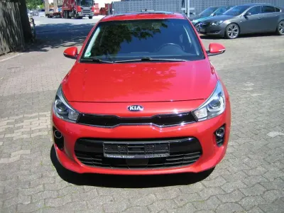 Gebraucht Kia Rio Platinum Edition 120 PS (88 kW) 2020 (beg) signalrot met. Kleinwagen