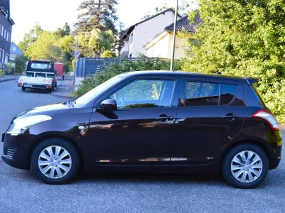 Gebraucht Suzuki Swift Club 94 PS (69 kW) 2013 Braun Kleinwagen