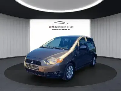 Gebraucht Mitsubishi Colt Plus 95 PS (69 kW) 2013 Granitbraun m Kleinwagen
