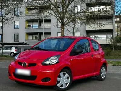 Gebraucht Toyota Aygo 68 PS (50 kW) 2009 Rot Kleinwagen