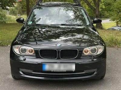 Gebraucht BMW 116 122 PS (89 kW) 2009 Schwarz Kleinwagen