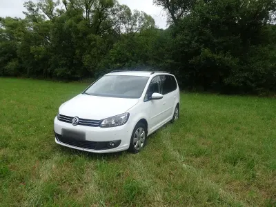 Gebraucht VW Touran Comfortline 105 PS (77 kW) 2014 Weiß Van / Kleinbus