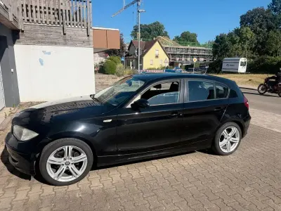 Gebraucht BMW 116 122 PS (89 kW) 2009 Schwarz Kleinwagen