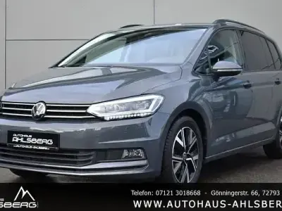 Gebraucht VW Touran Comfortline 150 PS (110 kW) 2024 Delfingrau Van / Kleinbus