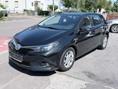 Gebraucht Toyota Auris Hybrid Edition-S 99 PS (72 kW) 2016 Black mica / ink Limousine