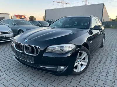 Second-hand BMW 520 Sport Line 184 CP (135 kW) 2012 Negru Break
