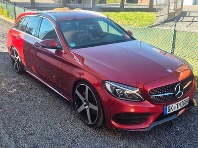 Second-hand Mercedes C250 AMG line 204 CP (150 kW) 2015 Roșu Berlinǎ