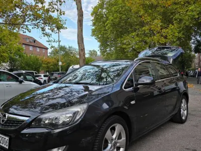 Gebraucht Opel Astra 136 PS (100 kW) 2011 Schwarz Kombi