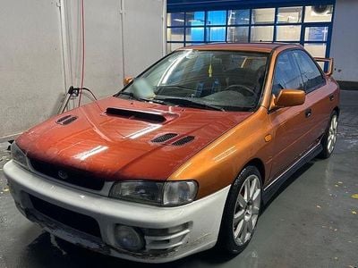 Second-hand Subaru Impreza GT 125 CP (91 kW) 1996 Portocaliu Berlinǎ