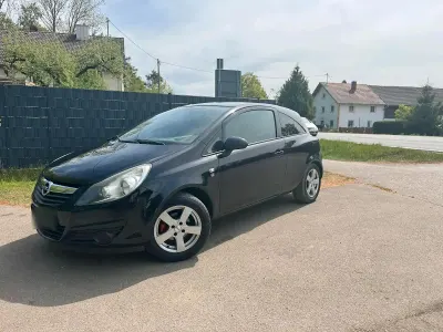 Używany Opel Corsa 90 KM (66 kW) 2010 Czarny Hatchback