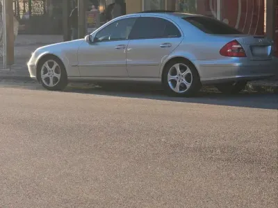 Używany Mercedes E200 122 KM (89 kW) 2005 Srebrny Sedan/Limuzyna