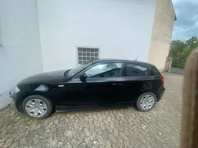 Używany BMW 116 116 KM (85 kW) 2009 Czarny Hatchback