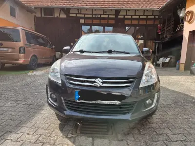 Używany Suzuki Swift X-TRA 94 KM (69 kW) 2015 Purpurowy Hatchback