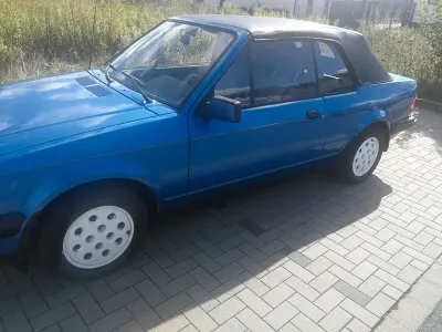 Gebraucht Ford Escort Cabriolet 105 PS (77 kW) 1984 Blau Cabrio