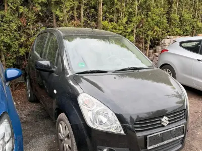 Gebraucht Suzuki Splash 86 PS (63 kW) 2009 Schwarz Kleinwagen
