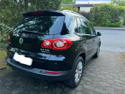 Używany VW Tiguan Team 140 KM (102 kW) 2011 Czarny SUV