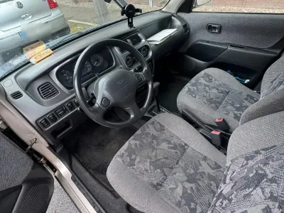 Gebraucht Daihatsu Sirion 56 PS (41 kW) 1999 Silber Kleinwagen