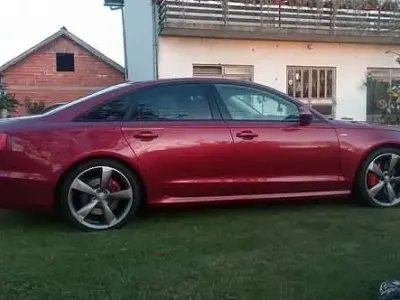 Używany Audi A6 Ambiente 313 KM (230 kW) 2014 Czerwony Sedan/Limuzyna
