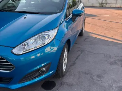 Gebraucht Ford Fiesta Titanium 101 PS (74 kW) 2012 Blau Kleinwagen