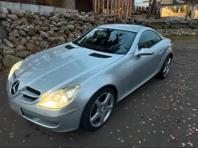 Second-hand Mercedes SLK200 163 CP (119 kW) 2004 Argintiu Cabrio