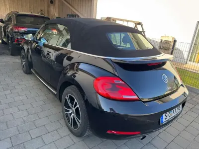 Gebraucht VW Beetle Basis 105 PS (77 kW) 2013 Schwarz Kleinwagen