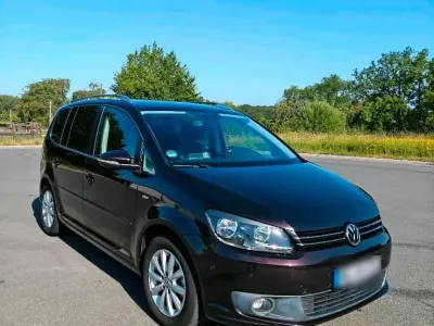 Gebraucht VW Touran Life 105 PS (77 kW) 2013 Violet Van / Kleinbus