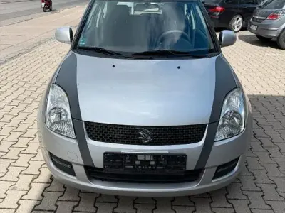 Używany Suzuki Swift 92 KM (67 kW) 2010 Srebrny Hatchback
