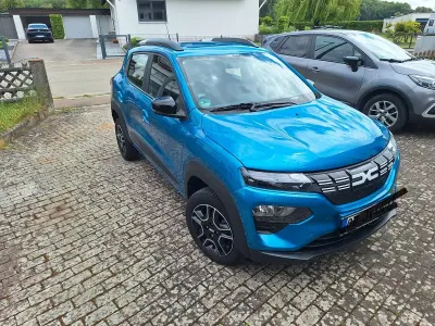 Używany Dacia Spring Essentiel 33 kW (45 KM) 2022 Niebieski Hatchback