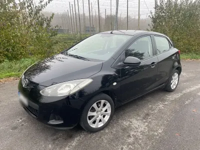 Gebraucht Mazda 2 75 PS (55 kW) 2009 Schwarz Kleinwagen